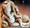 Ганеша- индийский бог богатства. Добродушный толстяк с головой слона и одним бивнем